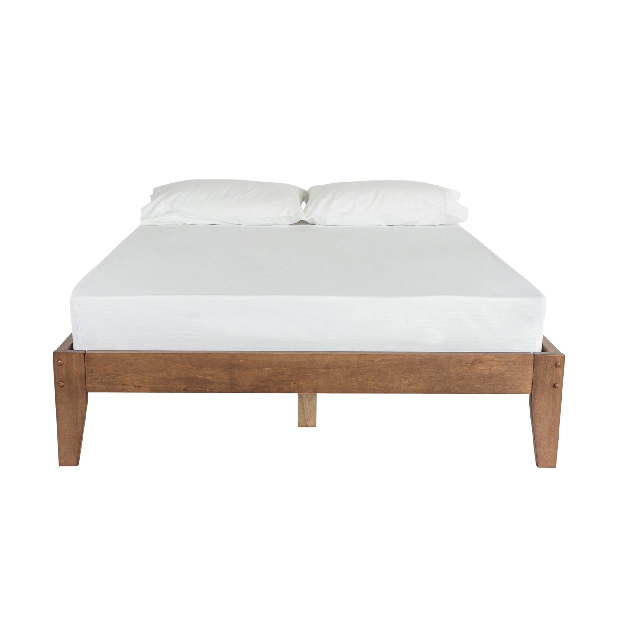 The Kyan Double Bed Base in chestnut features a timber frame, displayed front-facing, and supports a white mattress along with two plush white pillows.