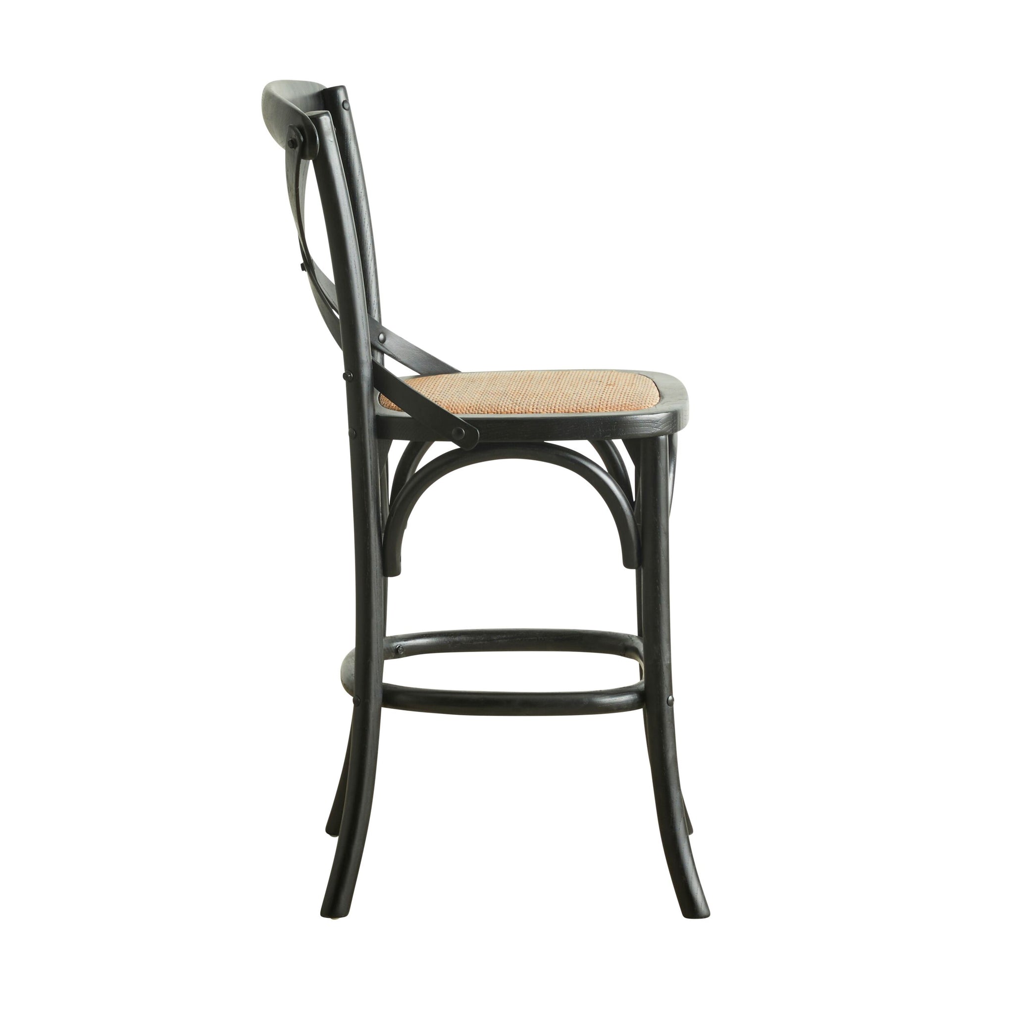 The Provincial Cross Back Dining Stool Black showcases a Parisian chic style with its side view featuring a wooden frame, curved backrest, woven seat, and footrest connecting the legs, embodying French Provincial design elegance.