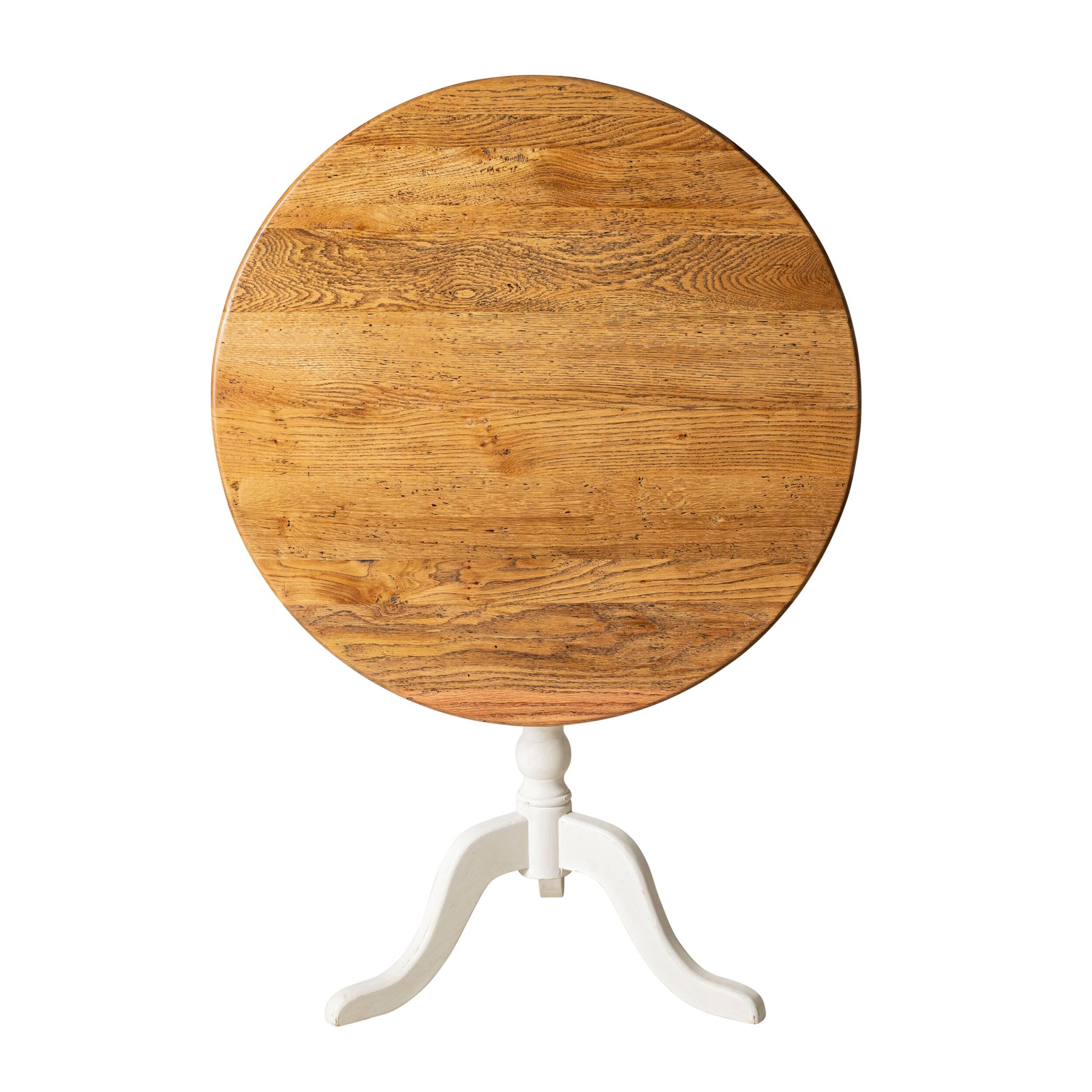 The Provincial Oak Drop-Down Cafe Table features a round wooden top with a Provincial Oak finish and a white tripod base, effortlessly combining modern design with French provincial style.