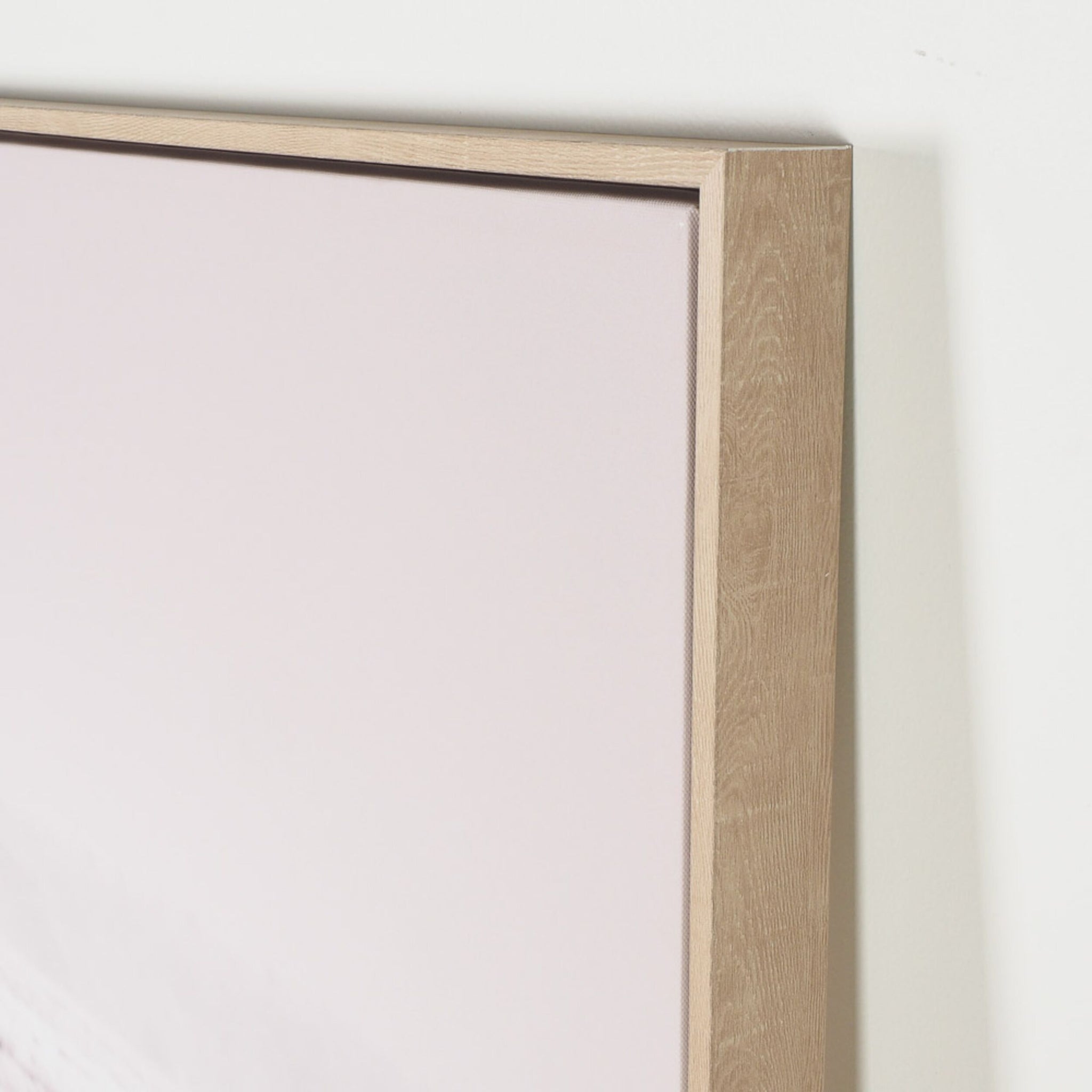 Close-up of a wooden picture frame corner, angled against a light background, ideal for displaying the Scottish Highland Cow Herd Framed Print 140x100cm or enhancing rustic décor with its Scottish charm.