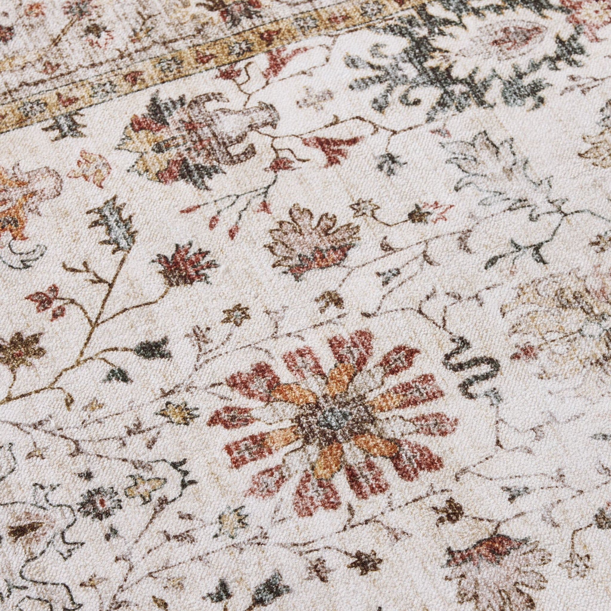 Close-up of the Tarot Nouveau Washable Runner (80x200cm) showcasing floral and vine motifs in muted red, green, and brown on a cream background.